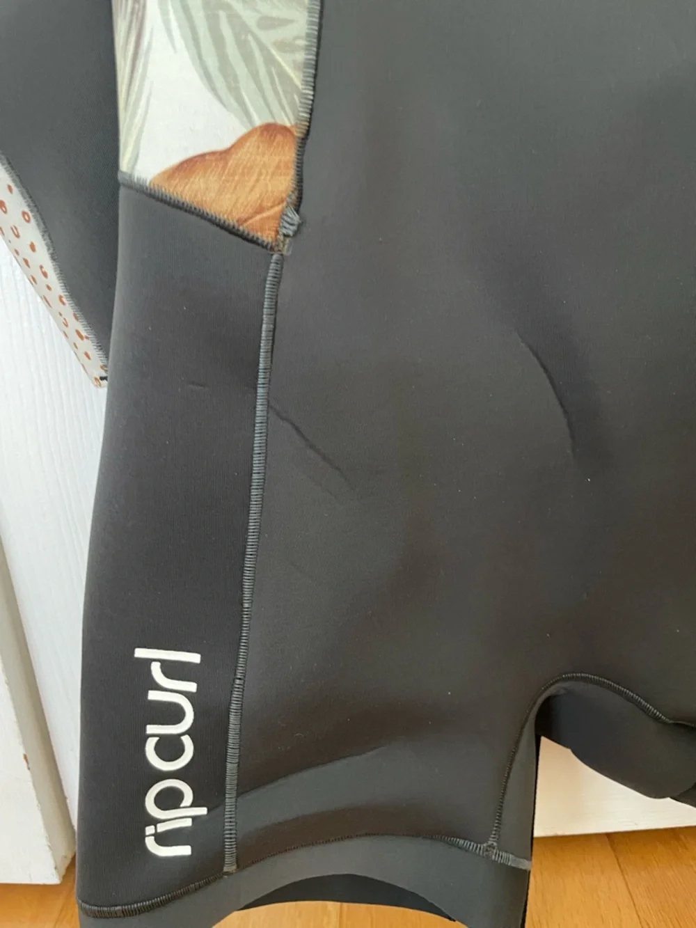 Rip Curl Black Shorty Wetsuit with Subtle Print Trim